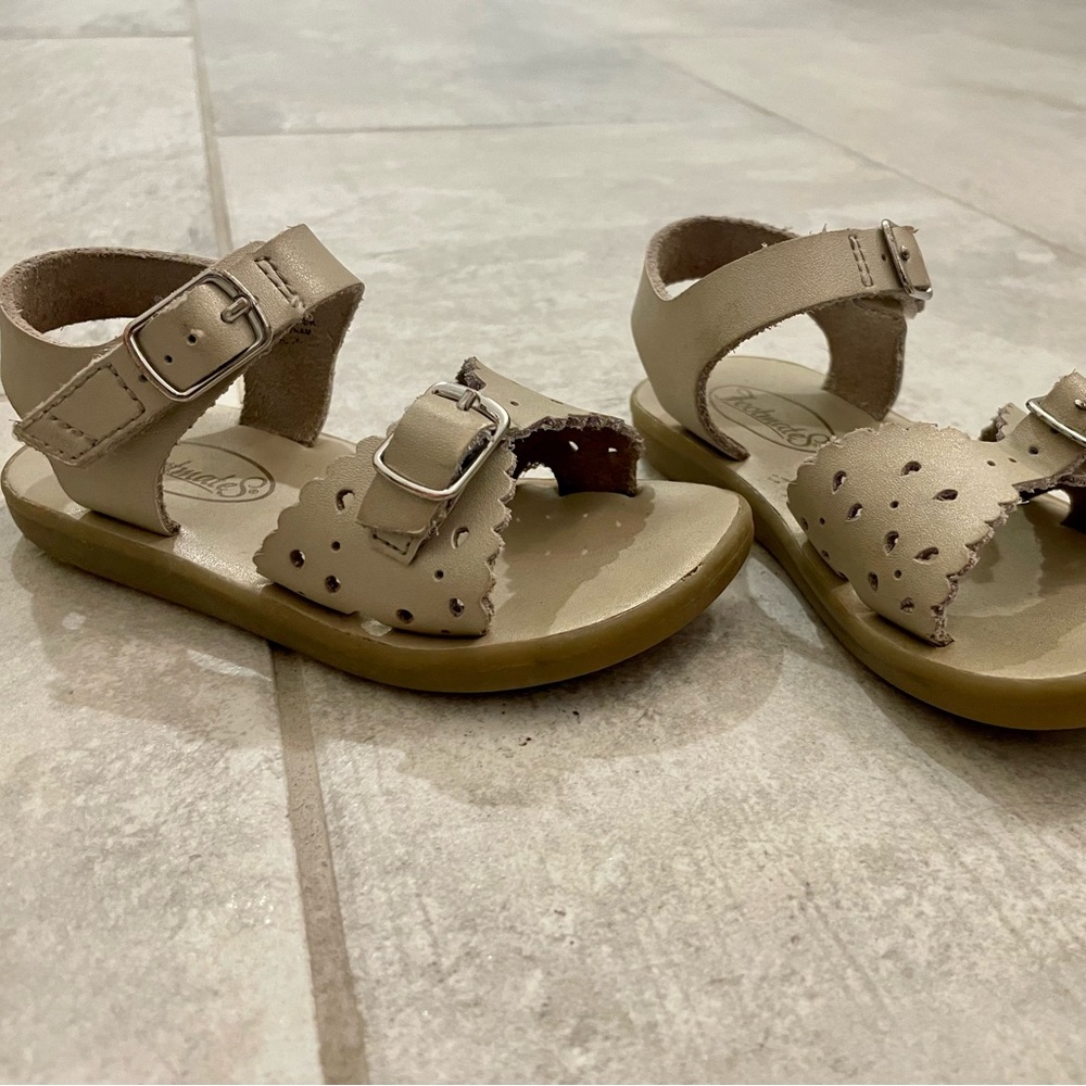 Footmates champagne colored sandals with Velcro and buckles; size 7